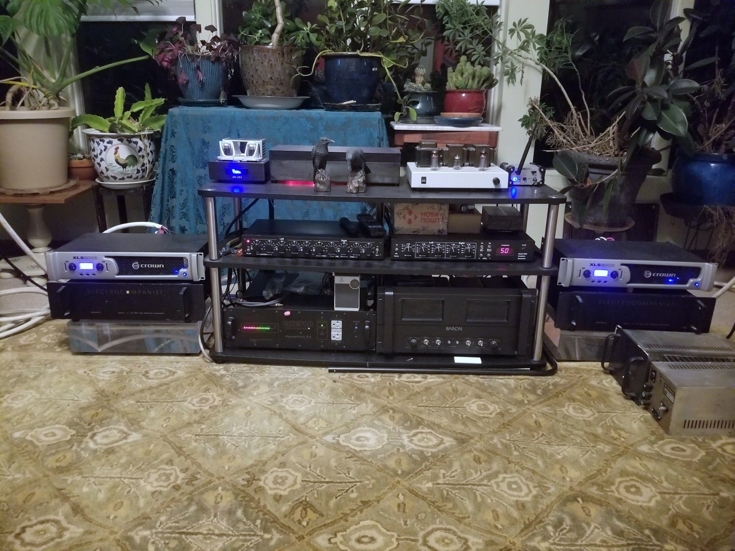 amps, eq's, power conditioner - gear on rack between speakers.jpg
