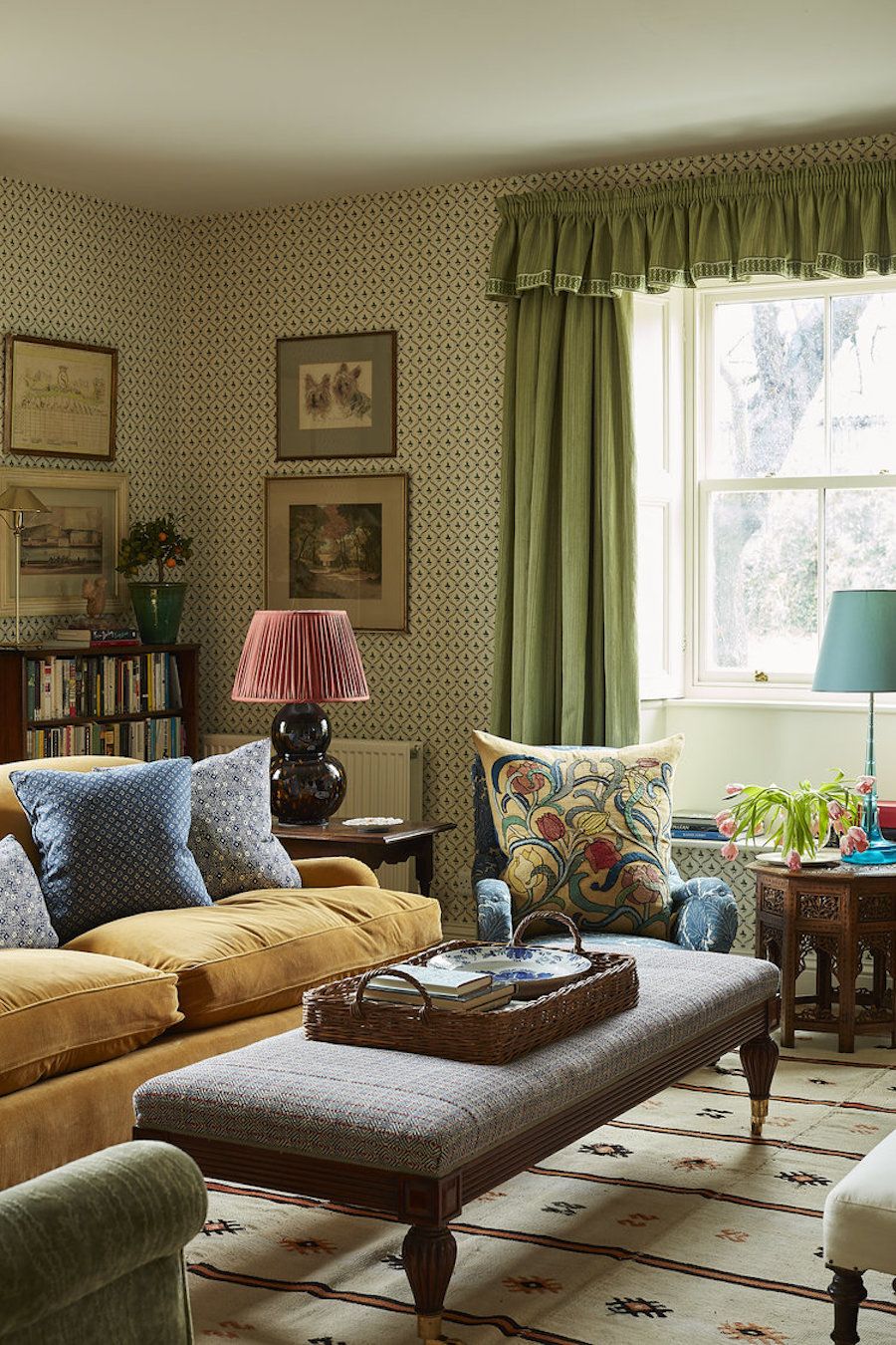English-Country-Living-Room-with-Plush-Seating-and-Patterned-Wallpaper-via-Rita-Konig.jpg