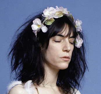 Patti Smith with a crown of flowers.jpg