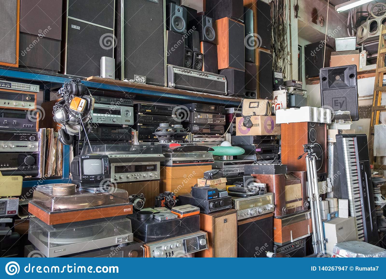 vintage-radio-receivers-tv-speakers-other-old-electronic-devices-jaffa-flea-market-store-shelv...jpg